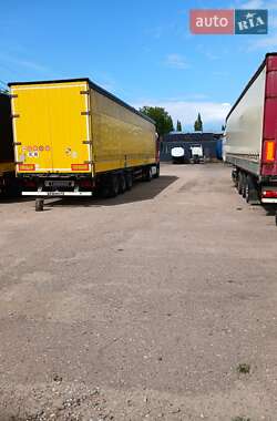 Бортовий напівпричіп Schmitz Cargobull S01 2005 в 