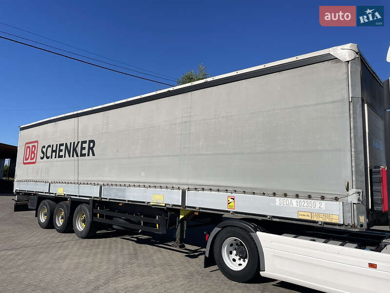 Тентованный борт (штора) - полуприцеп Schmitz Cargobull S01 2010 в Вараше