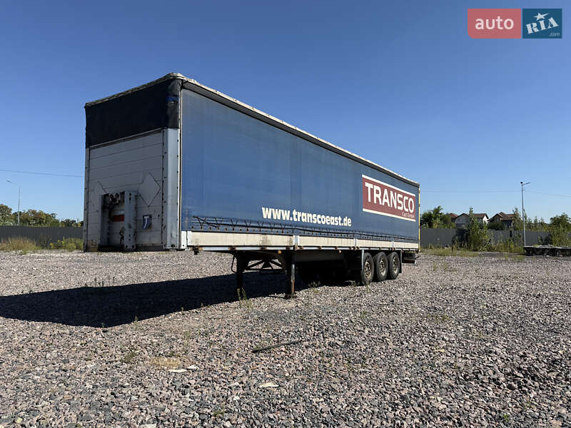 Бортовой полуприцеп Schmitz Cargobull S01 2002 в Киеве