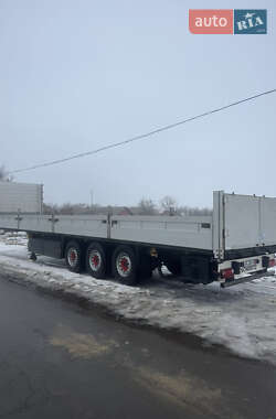 Бортовой полуприцеп Schmitz Cargobull S01 2009 в Благовещенском