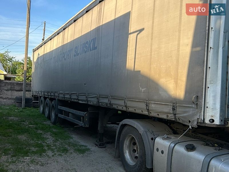 Тентованный борт (штора) - полуприцеп Schmitz Cargobull S01 2003 в Сумах фото Тентованный борт (штора) - полуприцеп Schmitz Cargobull S01 2003 в Сумах
