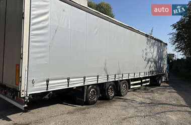 Тентований борт (штора) - напівпричіп Schmitz Cargobull SCS 2004 в Львові