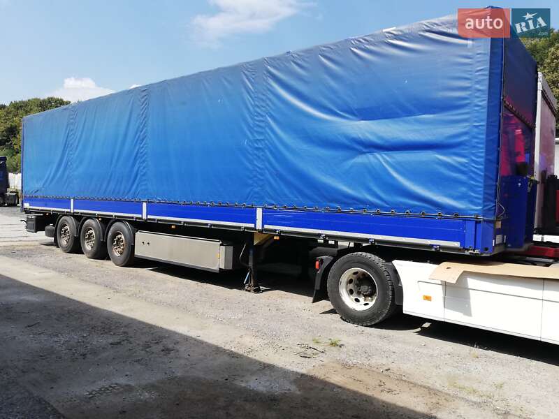 Бортовой полуприцеп Schmitz Cargobull SO1 2014 в 