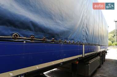 Бортовой полуприцеп Schmitz Cargobull SO1 2014 в 