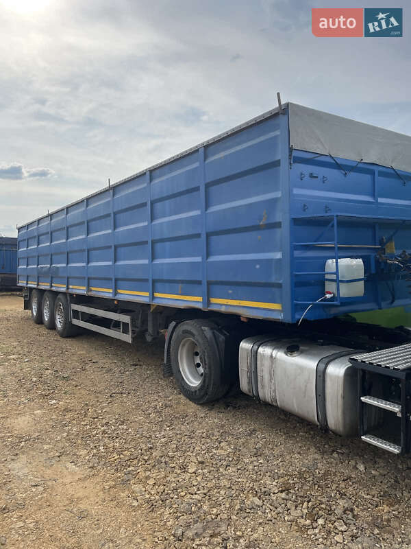 Бортовий напівпричіп Schmitz S-01 2002 в Новій Одесі