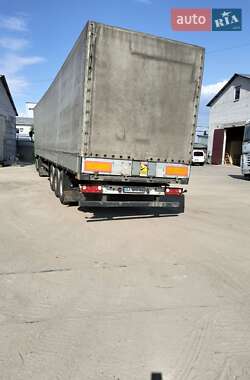Бортовой полуприцеп Schmitz S-01 2003 в 
