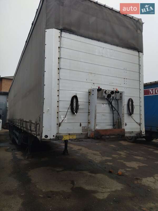 Тентованный борт (штора) - полуприцеп Schmitz S-01 2003 в Лубнах