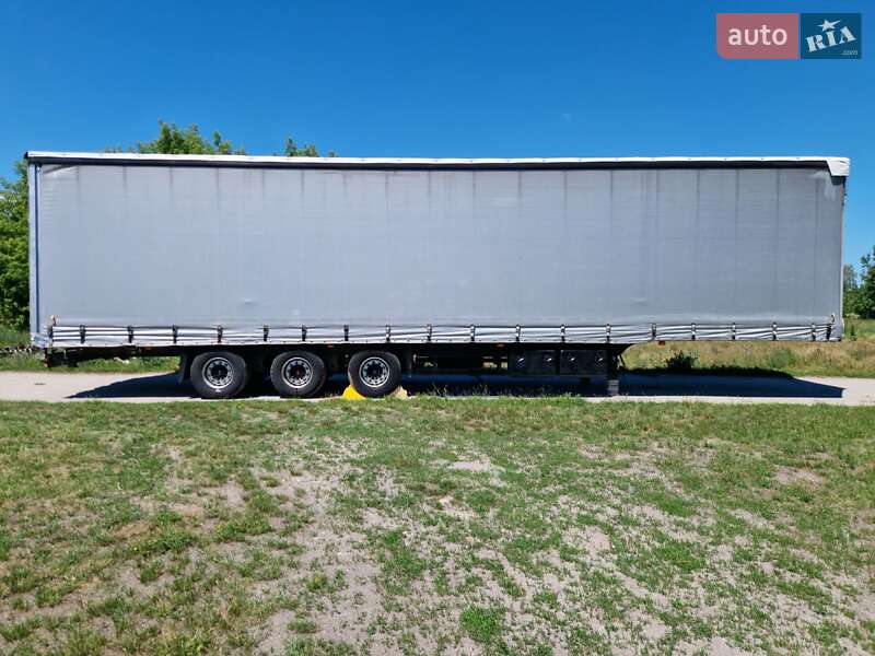 Тентованный борт (штора) - полуприцеп Schmitz S-01 2005 в Остроге фото 3 Тентованный борт (штора) - полуприцеп Schmitz S-01 2005 в Остроге