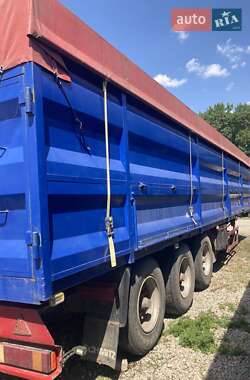 Бортовой полуприцеп Schmitz SCS 24 1999 в 
