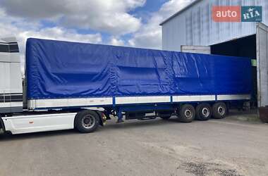 Бортовой полуприцеп Schmitz SPR 24 2002 в 