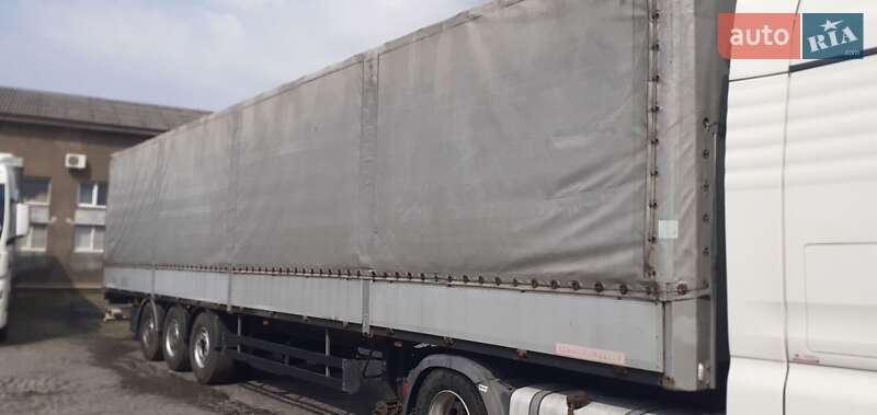 Бортовий напівпричіп Schwarzmuller J-Serie 2012 в Мукачевому