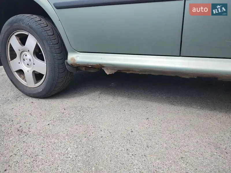 Skoda Octavia 2003 VIN TMBSL41UX38697160 фото оголошення 11 з 49