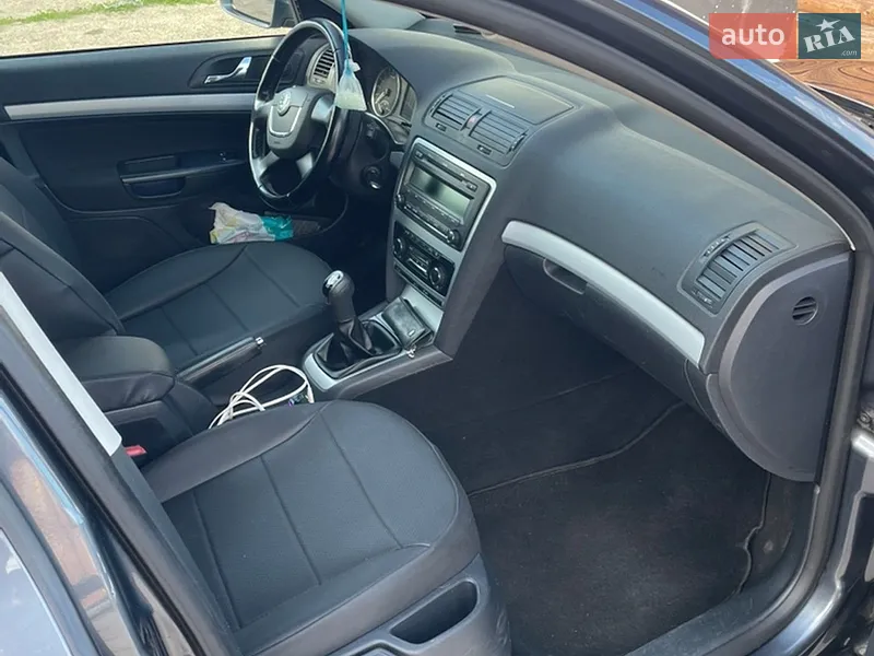 Skoda Octavia 2011 VIN TMBHT61Z3B2121669 фото оголошення 10 з 56