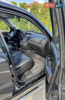 Внедорожник / Кроссовер SsangYong Rexton 2009 в 
