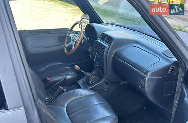 Внедорожник / Кроссовер Suzuki Sidekick 1995 в 