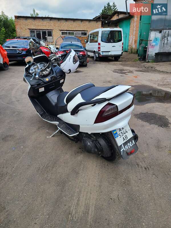 Грузовые мотороллеры, мотоциклы, скутеры, мопеды Suzuki Skywave Type S400 2003 в Ровно фото 7 Грузовые мотороллеры, мотоциклы, скутеры, мопеды Suzuki Skywave Type S400 2003 в Ровно