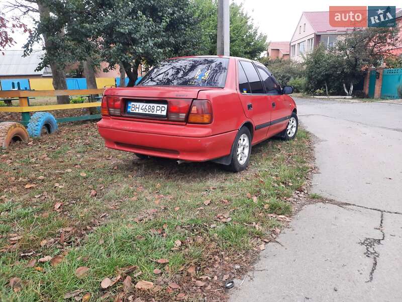 Седан Suzuki Swift 1998 в Лубнах