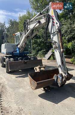 Колесный экскаватор Takeuchi TB 2007 в 
