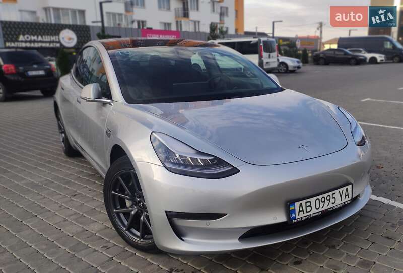 2018 Tesla Model 3, VIN 5YJ3E1EB4JF089945:plate — фото 1 (autoria)