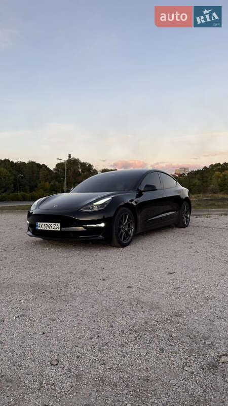 2021 Tesla Model 3, VIN 5YJ3E1EB9MF999871:plate — фото 1 (autoria)