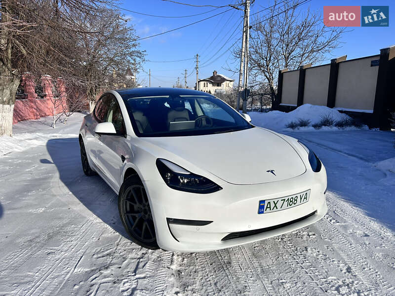 2022 Tesla Model 3, VIN 5YJ3E1EB7NF257440:plate — фото 1 (autoria)