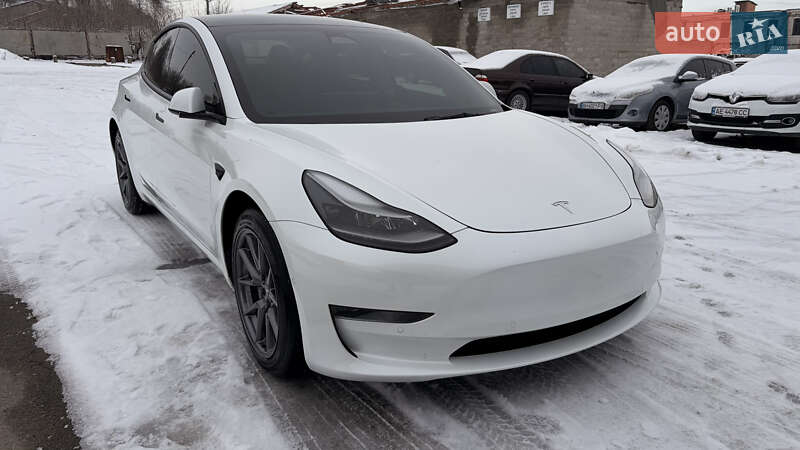 2022 Tesla Model 3, VIN 5YJ3E1EB5NF265052:plate — фото 1 (autoria)