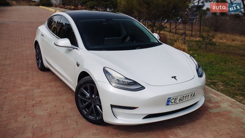 2019 Tesla Model-3, VIN 5YJ3E1EA0KF422909:plate — фото 1 (autoria)