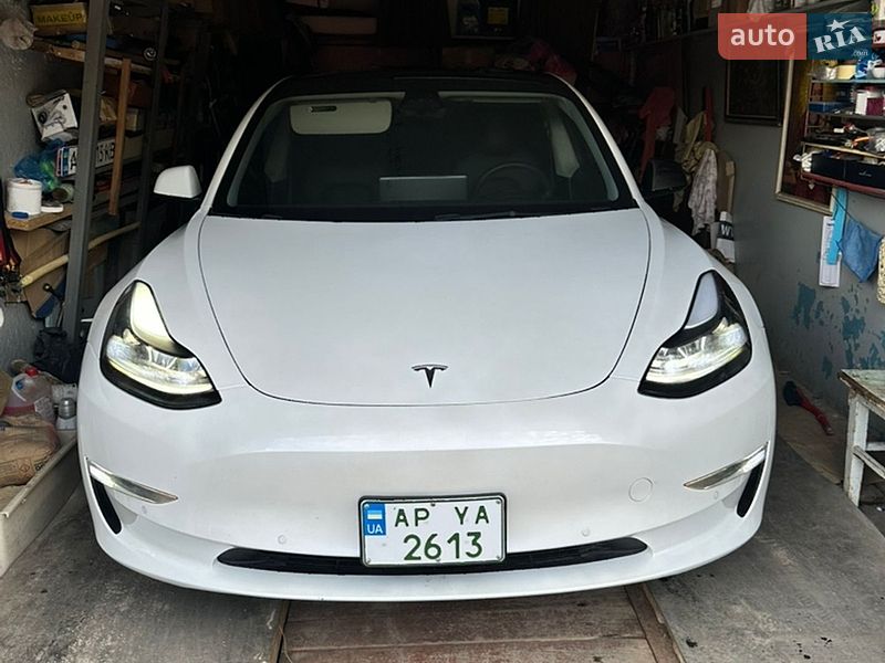 2021 Tesla Model 3, VIN 5YJ3E1EB7NF108073:plate — фото 1 (autoria)