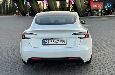 Седан Tesla Model 3 2024 в Бучі