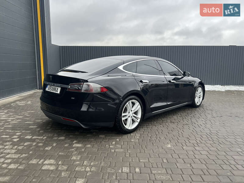 2015 Tesla Model-S, VIN 5YJSA1V1XFF099370:plate — фото 1 (autoria)