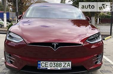Автомобиль тесла красный цвет
