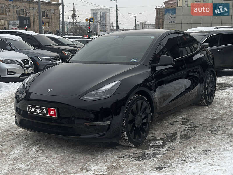 2022 Tesla Model Y, VIN 7SAYGDEFXNF467389:plate — фото 1 (autoria)