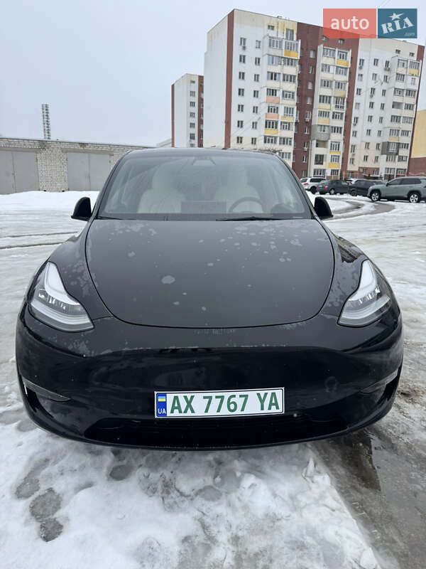 2021 Tesla Model Y, VIN 5YJYGDEE2MF187145:plate — фото 1 (autoria)