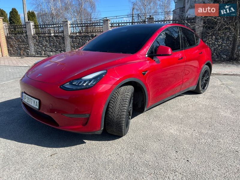 2021 Tesla Model Y, VIN 5YJYGDEE2MF142903:plate — фото 1 (autoria)