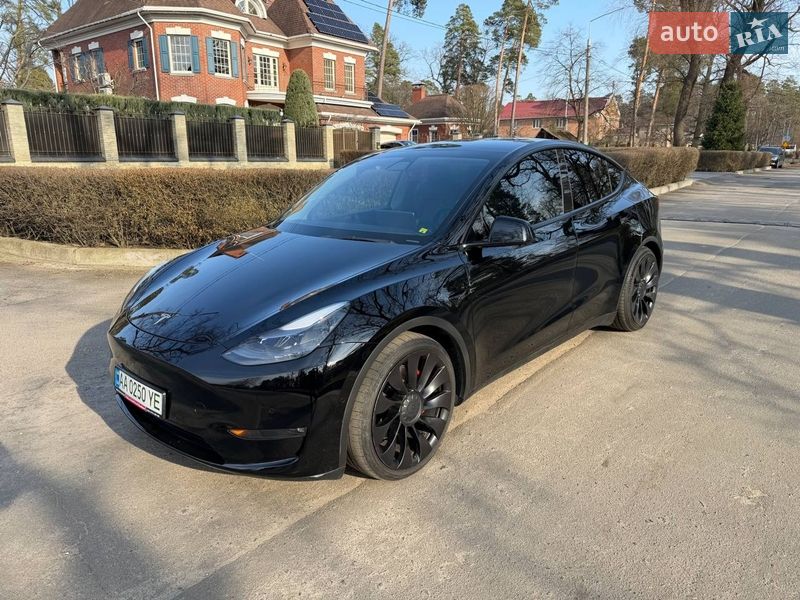 2022 Tesla Model Y, VIN 7SAYGDEF8NF391851:plate — фото 1 (autoria)