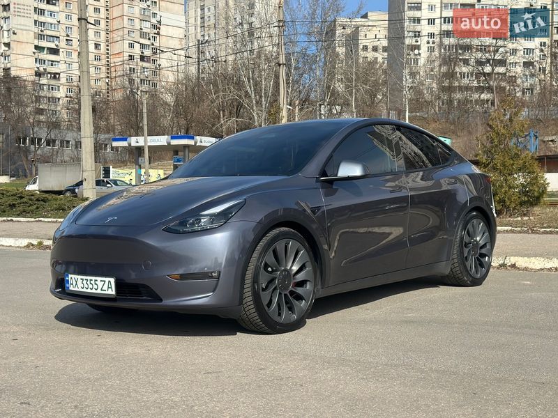 2023 Tesla Model Y, VIN 7SAYGDEF3PF902322:plate — фото 1 (autoria)