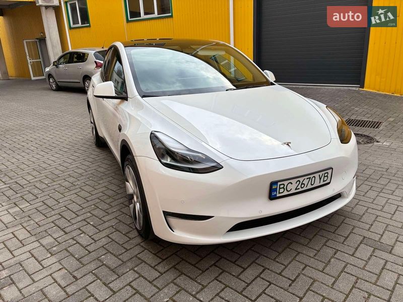 2022 Tesla Model Y, VIN 7SAYGAEE4NF545283:plate — фото 1 (autoria)