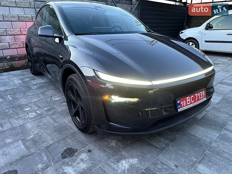 2026 Tesla Model Y, VIN 7SAYGDED0TF390477:plate — фото 1 (autoria)