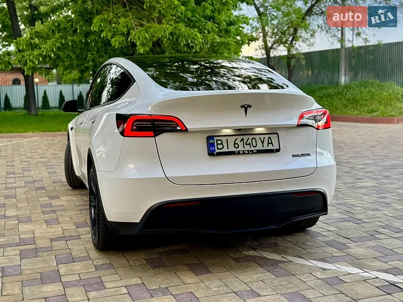 Tesla Model Y 2021 VIN 5YJYGDEE9MF209321 фото оголошення 6 з 59