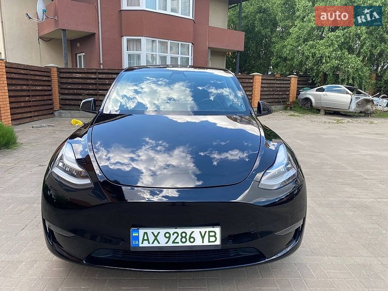 2020 Tesla Model Y, VIN 5YJYGDEE4LF018274:plate — фото 1 (autoria)