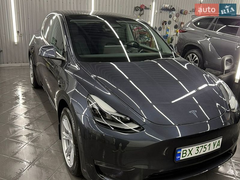 2024 Tesla Model Y, VIN 7SAYGDEE7RA228456:plate — фото 1 (autoria)