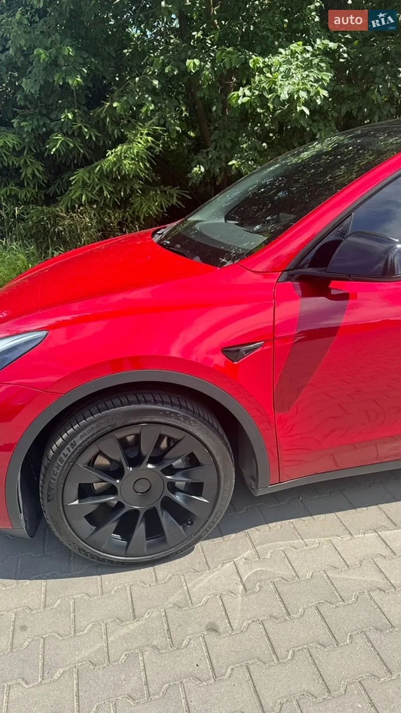 Tesla Model Y 2022 VIN LRWYGCFSXPC636858 фото оголошення 4 з 34