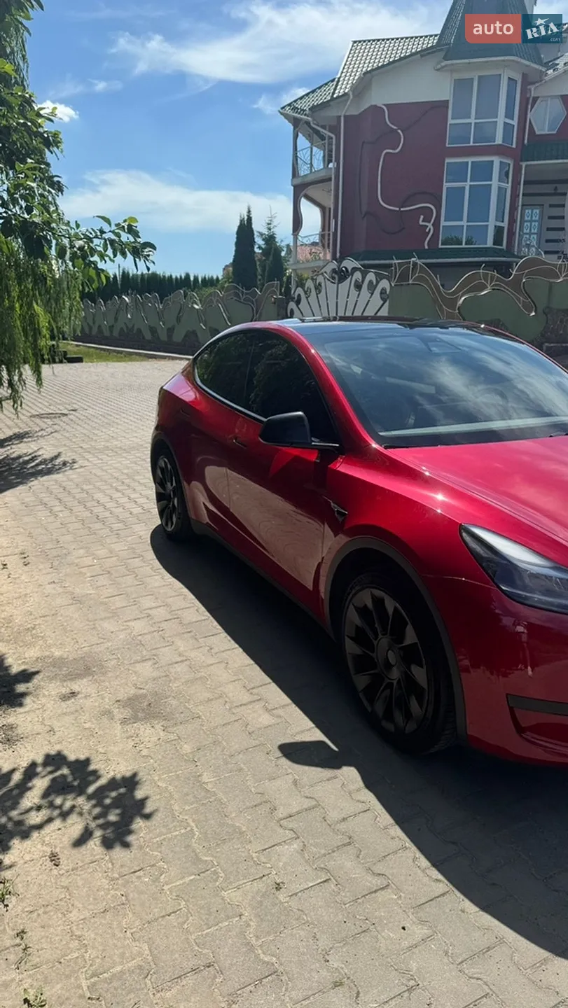 Tesla Model Y 2022 VIN LRWYGCFSXPC636858 фото оголошення 5 з 34