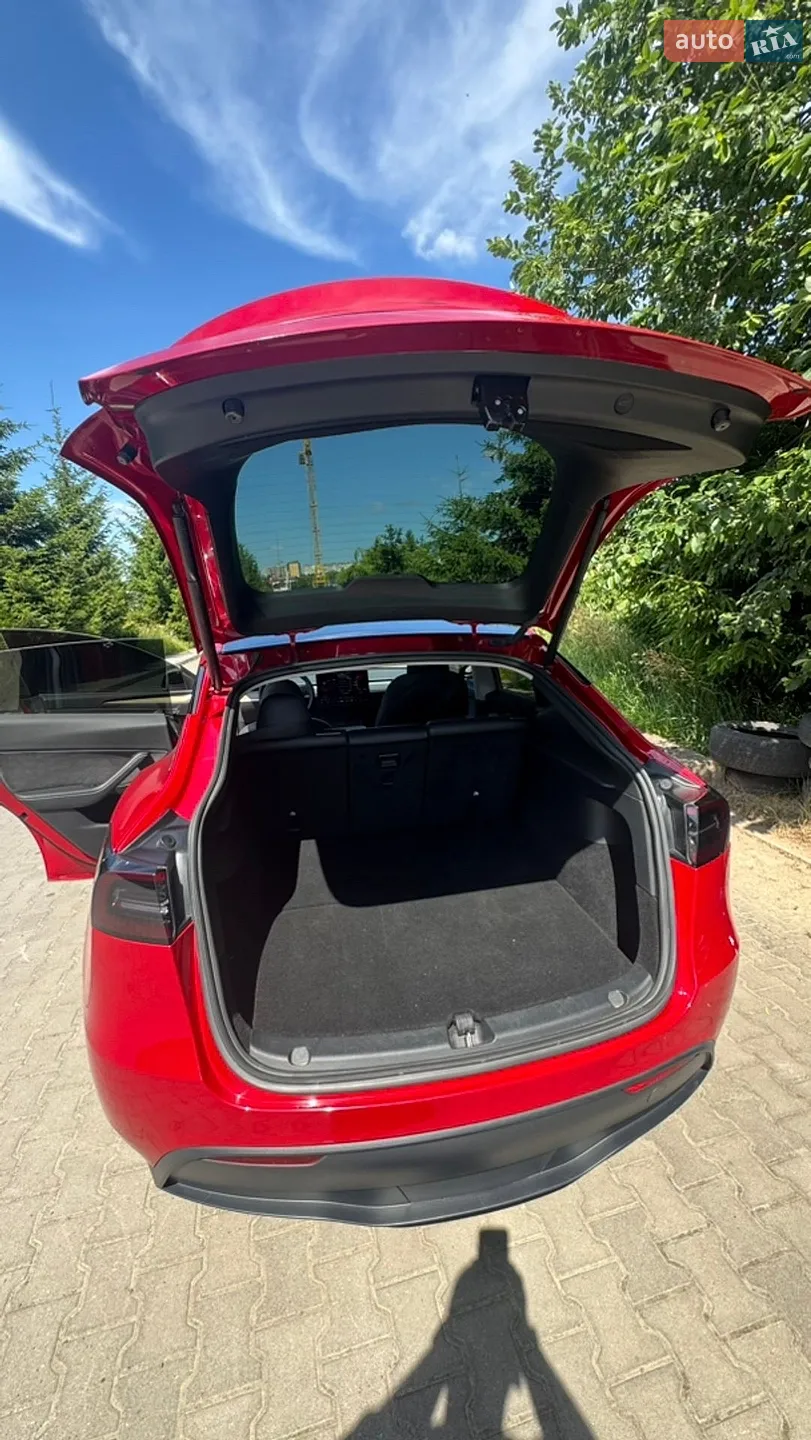 Tesla Model Y 2022 VIN LRWYGCFSXPC636858 фото оголошення 12 з 34