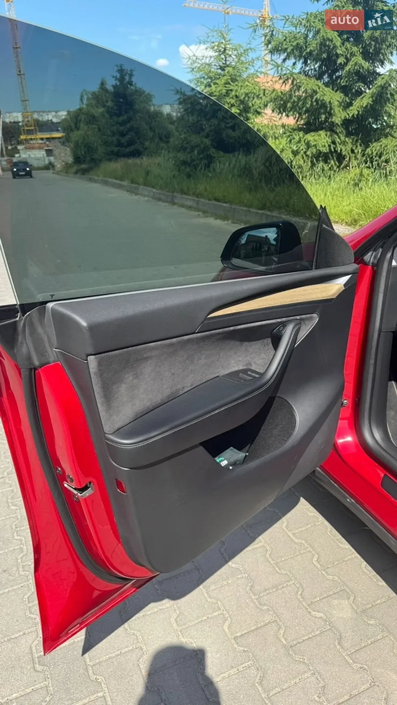 Tesla Model Y 2022 VIN LRWYGCFSXPC636858 фото оголошення 16 з 34
