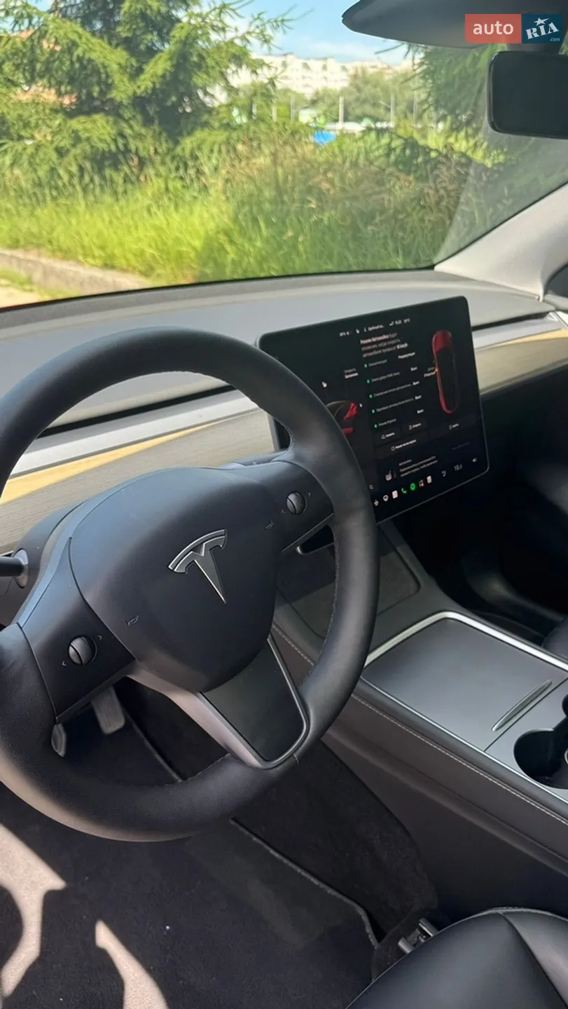 Tesla Model Y 2022 VIN LRWYGCFSXPC636858 фото оголошення 21 з 34
