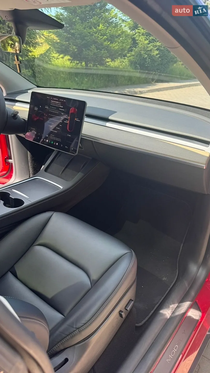 Tesla Model Y 2022 VIN LRWYGCFSXPC636858 фото оголошення 24 з 34