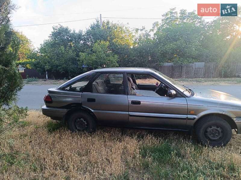 Хэтчбек Toyota Corolla 1987 в 