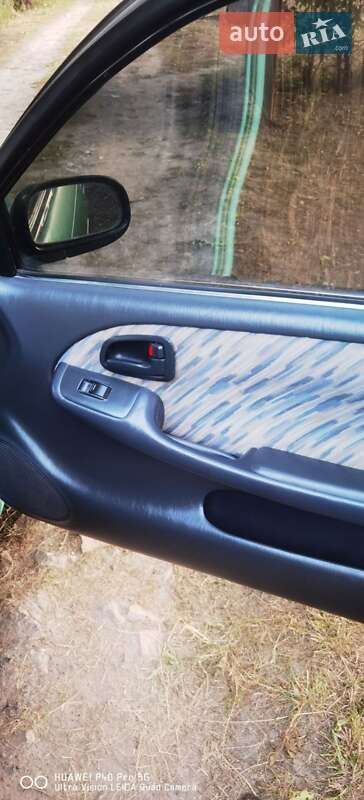 Хетчбек Toyota Corolla 1997 в Турбовом фото 6 Хетчбек Toyota Corolla 1997 в Турбовом