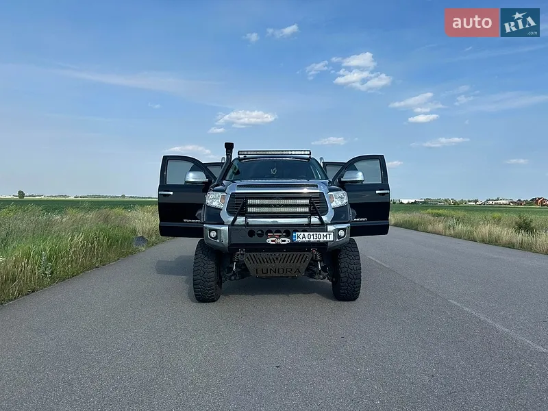Toyota Tundra 2014 VIN 5TFUY5F13EX412659 фото оголошення 11 з 93